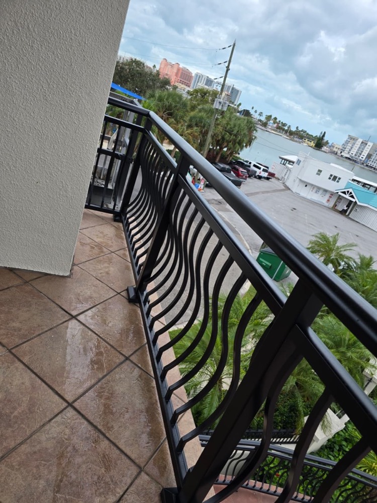Powder-coated balcony railing on a waterfront condominium