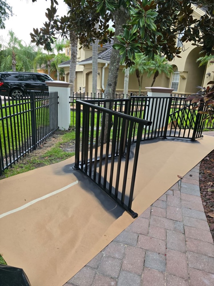 Electrostatically finished driveway gate