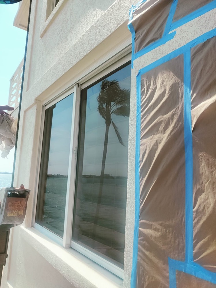 Ascend technician applying an electrostatic coating