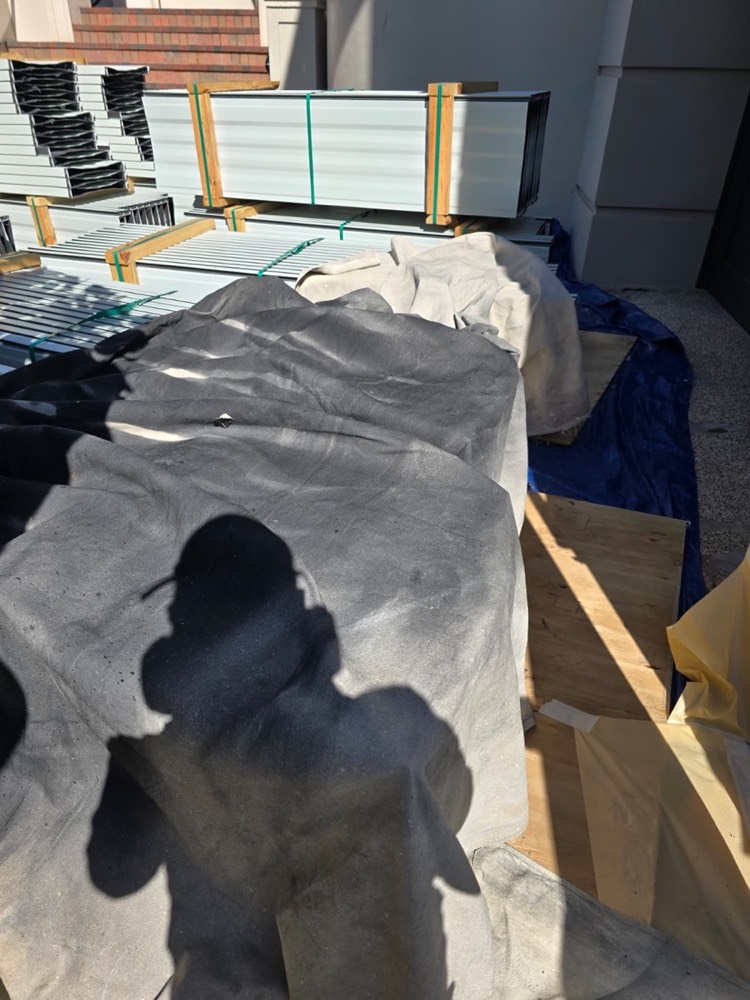 Ascend technician applying an electrostatic coating