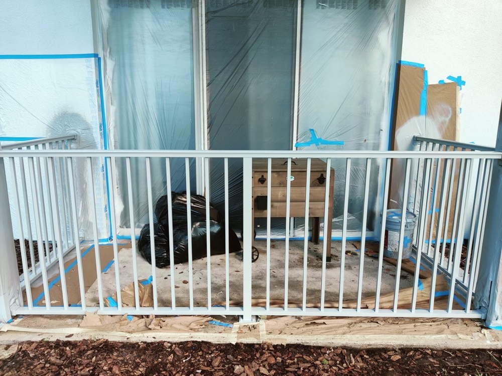 Ascend technician applying an electrostatic coating