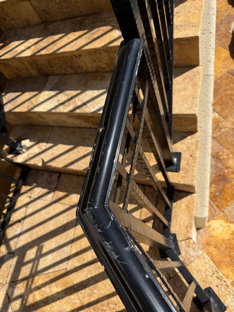 Recoated stair railing