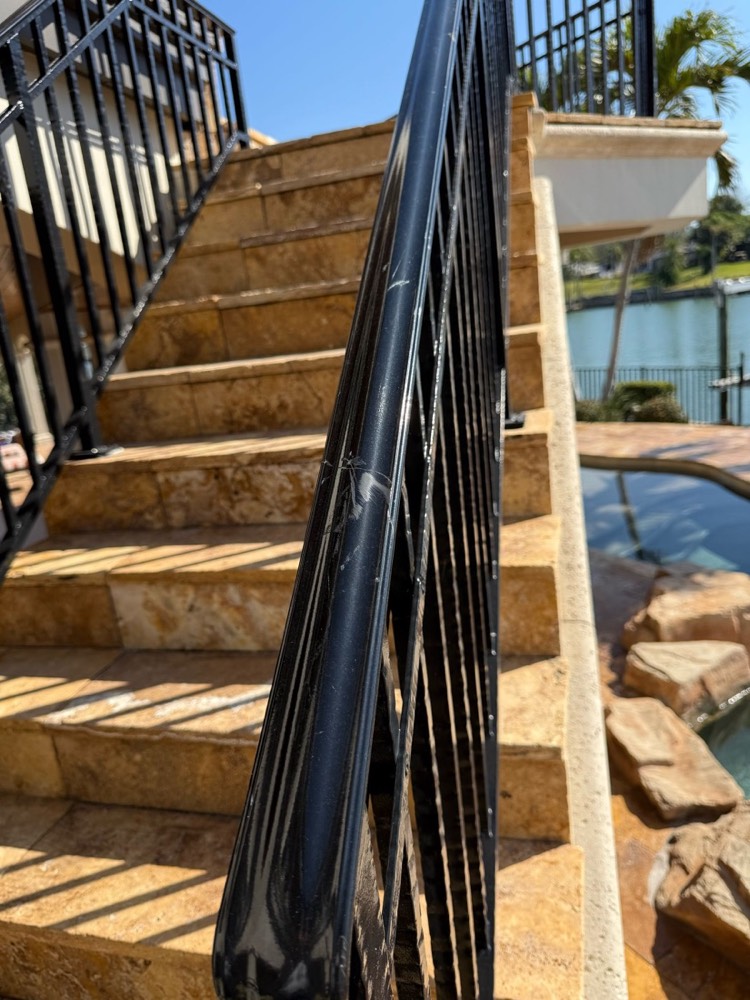 Recoated stair railing