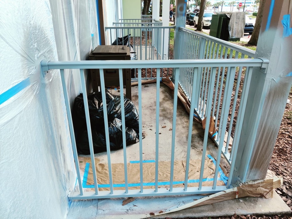 Recoated stair railing