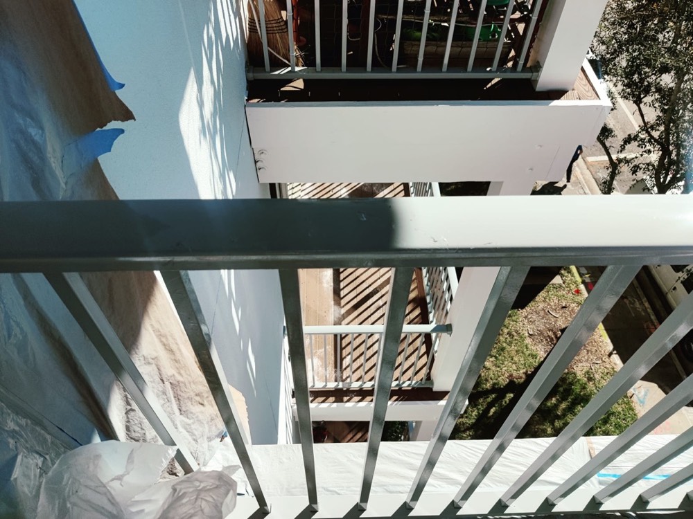 Recoated stair railing