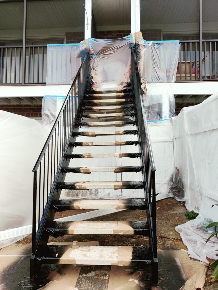 Recoated stair railing