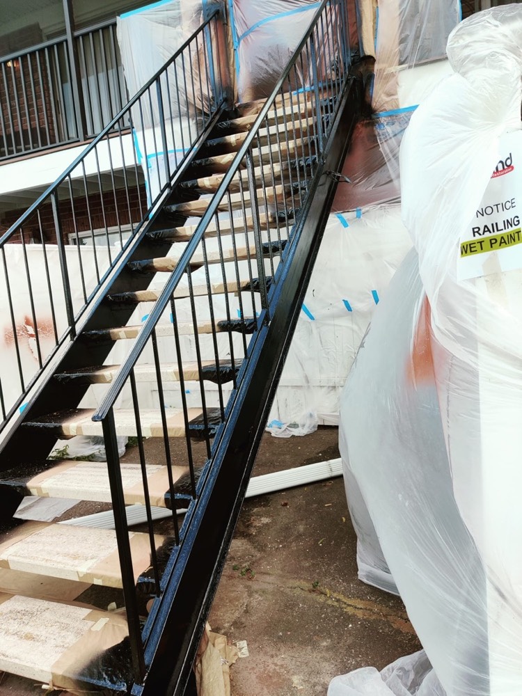 Recoated stair railing